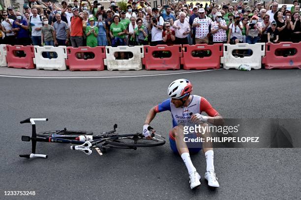 Team Groupama-FDJ's Jacopo Guarnieri of Italy sits on the road after crashing during the 6th stage of the 108th edition of the Tour de France cycling...