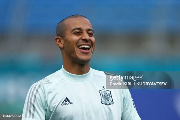 Spain's midfielder Thiago Alcantara reacts during an MD-1 training session at the Petrovsky Stadium in Saint Petersburg on July 1, 2021 on the eve of...