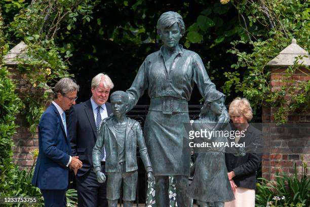 Sculptor Ian Rank-Broadley, Earl Spencer and Lady Sarah McCorquodale after the unveiling of the Diana, Princess of Wales statue in the Sunken Garden...