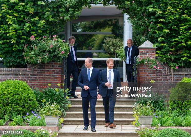 Prince William, Duke of Cambridge and Prince Harry, Duke of Sussex arrive for the unveiling of a statue they commissioned of their mother Diana,...