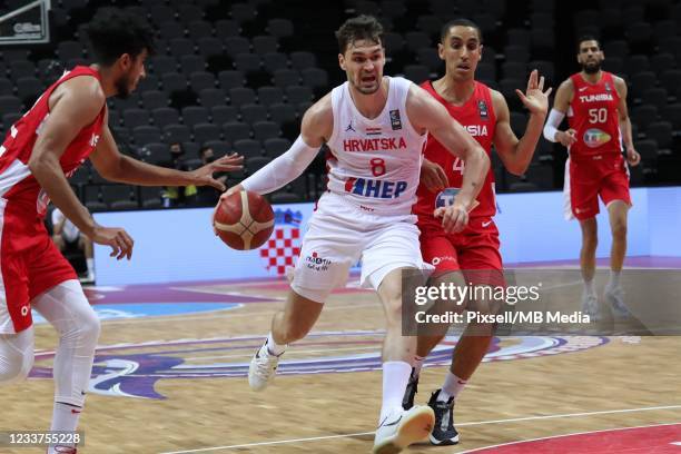 Mario Hezonja of Croatia leads the ball towards the basket during the 2020 FIBA Men's Olympic Qualifying Tournament game between Croatia and Tunisia...