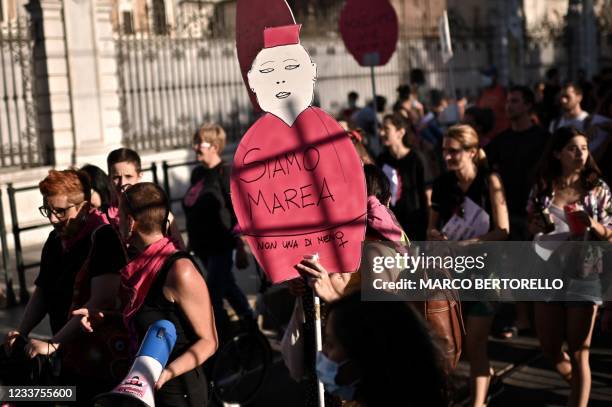 Members of the Non una di meno feminist group stage a protest on July 1, 2021 in Piazza Castello in Turin, northwestern Italy against the decision of...