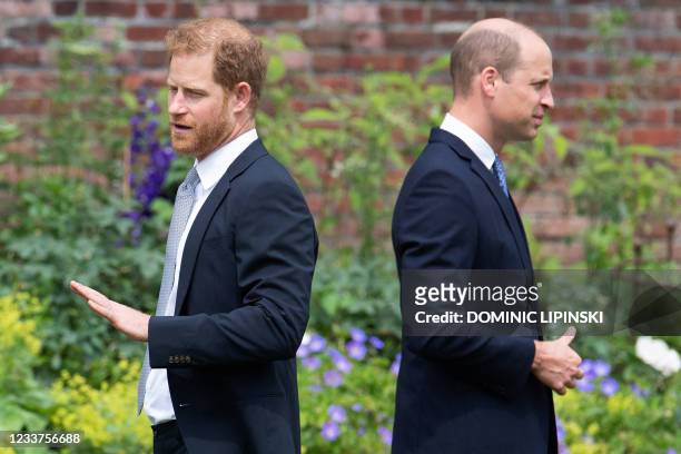 Britain's Prince Harry, Duke of Sussex and Britain's Prince William, Duke of Cambridge attend the unveiling of a statue of their mother, Princess...