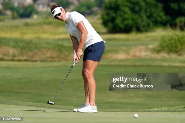 Brittany Lang putts on the 12th hole during the first round of the Volunteers of America Classic at the Old American Golf Club on July 1, 2021 in The...