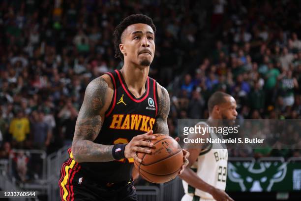 John Collins of the Atlanta Hawks shoots a free throw during Game 5 of the Eastern Conference Finals of the 2021 NBA Playoffs on July 1, 2021 at the...