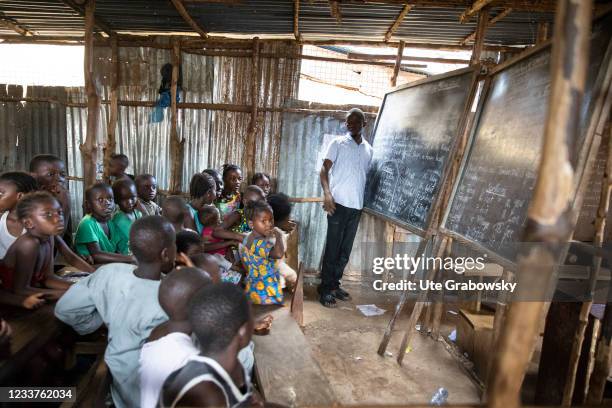 Freetown, SierraLeone School in Bomeh Village on June 15, 2021 in Freetown, Sierra Leone. The poorest of the poor have started to settle on the waste...