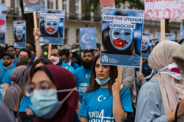 Demonstrators demonstrate in front of the Chinese embassy in support of the persecuted Uyghur Muslim community living in Xinjiang in northwest China on...