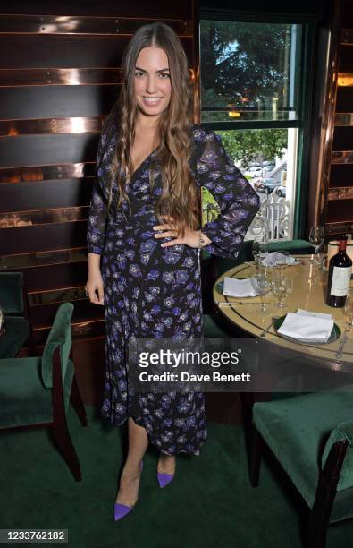 Amber Le Bon attends Andy Valmorbida and Untitled-1's dinner for the Richard Hambleton, Rizzoli and Castle Gallery collaboration on July 1, 2021 in...