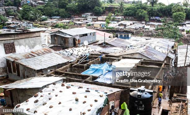 Freetown, SierraLeone Overview of Bomeh Village on June 15, 2021 in Freetown, Sierra Leone. The poorest of the poor have started to settle on the...