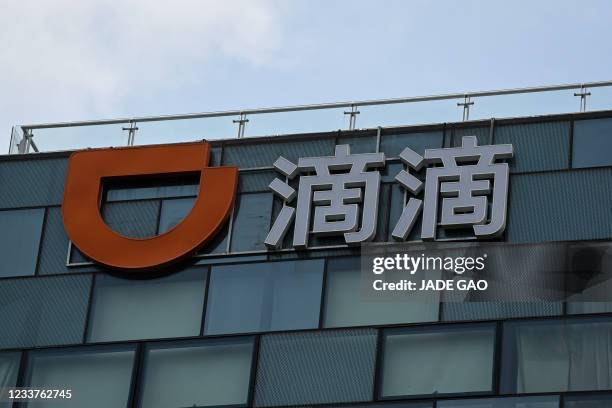 Logo of Chinese ride-hailing giant Didi Chuxing is seen at its headquarter in Beijing on July 2, 2021.