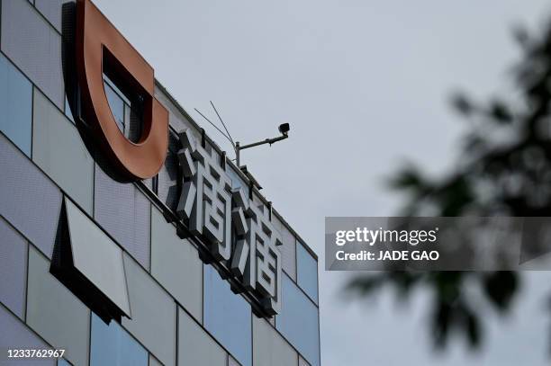 Logo of Chinese ride-hailing giant Didi Chuxing is seen at its headquarter in Beijing on July 2, 2021.
