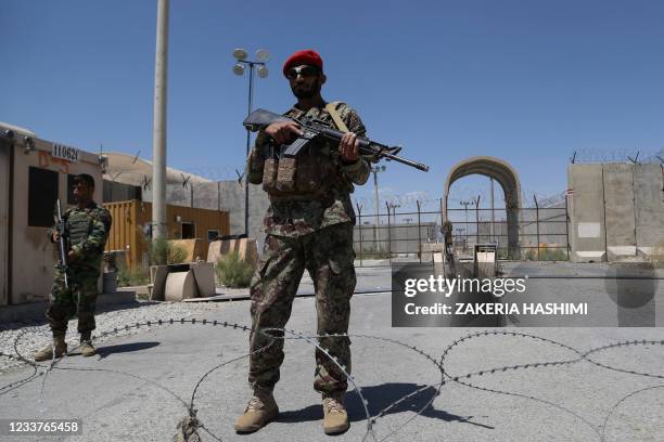 An Afghan National Army soldier stands guard at Bagram Air Base, after all US and NATO troops left, some 70 Km north of Kabul on July 2, 2021.