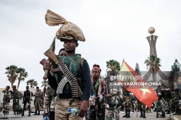 Tigray People's Liberation Front fighters prepare to leave for another field at Tigray Martyr's Memorial Monument Center in Mekele, the capital of...