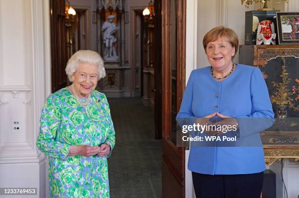 Queen Elizabeth II receives the Chancellor of Germany, Angela Merkel, during an audience at Windsor Castle on July 2, 2021 in Windsor, England....