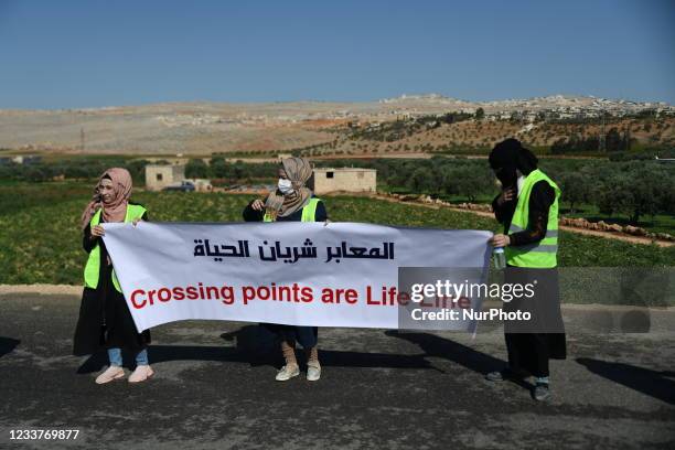 Protests to allow humanitarian aid to enter in Syria on July 2, 2021 in Idlib, Syria. A human chain is formed by workers from the civil society,...