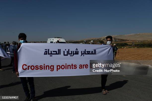 Protests to allow humanitarian aid to enter in Syria on July 2, 2021 in Idlib, Syria. A human chain is formed by workers from the civil society,...