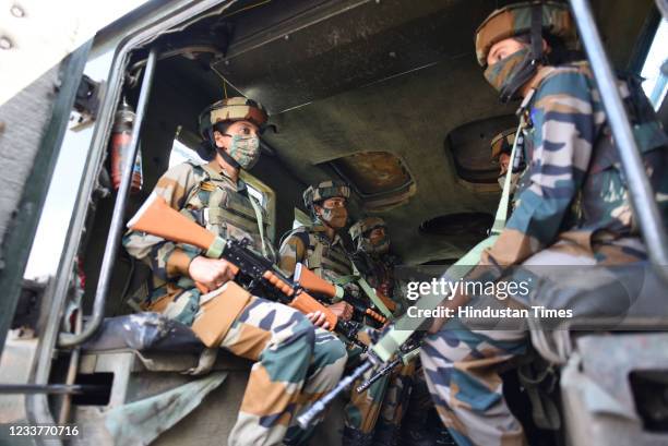 Women soldiers of Assam Rifle regiment seen inside an armoured vehicle at Wasun, in Ganderbal district, on July 2, 2021 in Srinagar, India.The Assam...