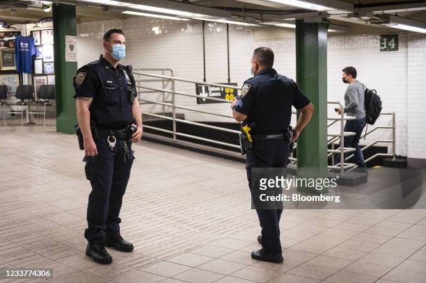 New York Police Department officers at the Union Square subway station in New York, U.S., on Friday, July 2, 2021. New York's Metropolitan...