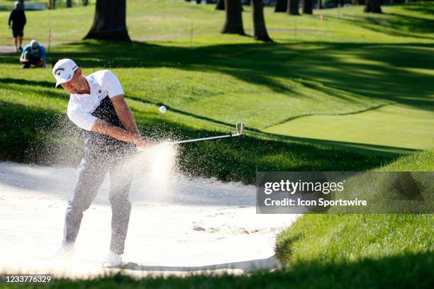 Golfer Tom Lewis hits out of a sand trap on the 9th hole on July 2, 2021 during the Rocket Mortgage Classic at the Detroit Golf Club in Detroit,...