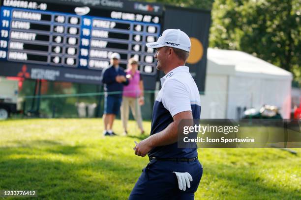 Golfer Tom Lewis walks off the 9th green as a co leader at 10 under par on July 2, 2021 during the Rocket Mortgage Classic at the Detroit Golf Club...