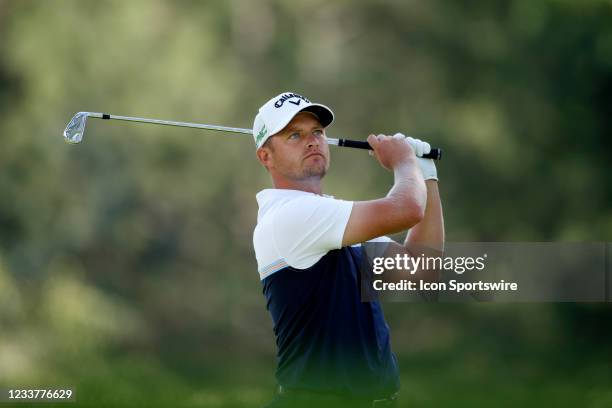 Golfer Tom Lewis hits his tee shot on the 9th hole on July 2, 2021 during the Rocket Mortgage Classic at the Detroit Golf Club in Detroit, Michigan.