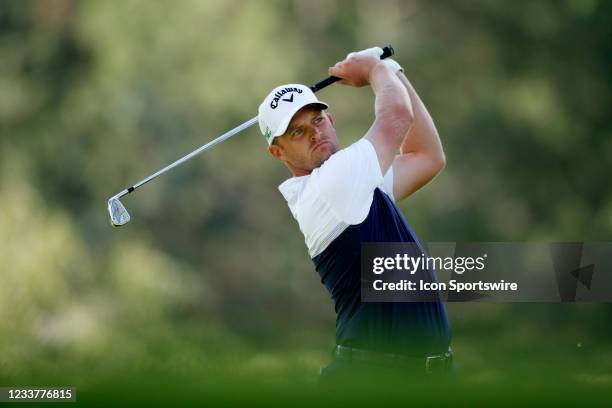 Golfer Tom Lewis hits his tee shot on the 9th hole on July 2, 2021 during the Rocket Mortgage Classic at the Detroit Golf Club in Detroit, Michigan.