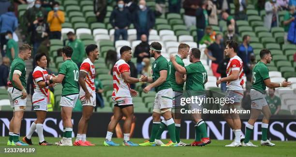 Dublin , Ireland - 3 July 2021; Players from both sides shake hands after the International Rugby Friendly match between Ireland and Japan at Aviva...