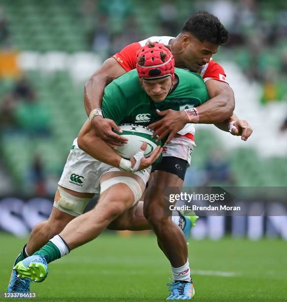 Dublin , Ireland - 3 July 2021; Josh van der Flier of Ireland is tackled by Siosaia Fifita of Japan during the International Rugby Friendly match...