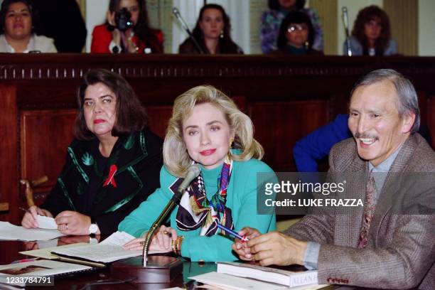 First lady Hillary Clinton holds a meeting to discuss Native American health care issues, on March 17 at the US capitol, flanked by Wilma Mankiller ,...