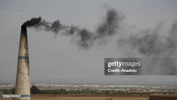 Smoke rises from a brick kiln near to the Bagram airfield in Kabul, Afghanistan, July 03, 2021. After nearly 20 years the U.S. Military left Bagram...