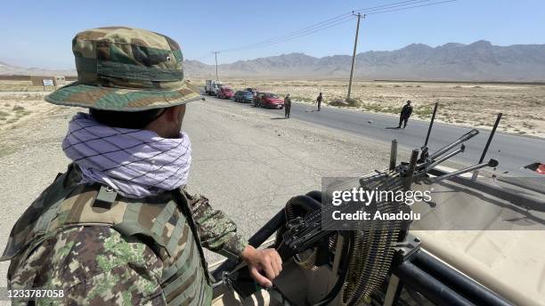 An Afghan National Army stands guard at a checkpoint on the road near to the Bagram airfield in Kabul, Afghanistan, July 03, 2021. After nearly 20...