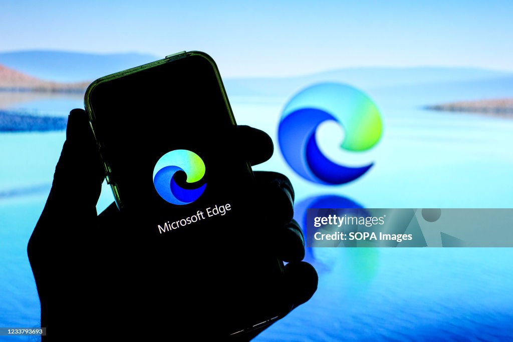 Web Browser Example Edge Image In this photo illustration, a Microsoft Edge web browser logo seen ...