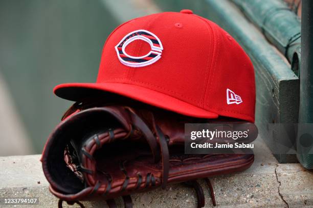 Close up view of a Cincinnati Reds caps with special logo during a game against the Chicago Cubs at Great American Ball Park on July 3, 2021 in...