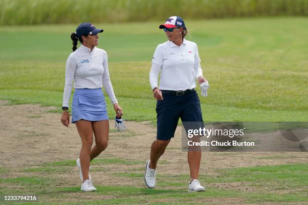 Katherine Kirk of Australia talks with Jaye Marie Green on the first fairway during the third round of the Volunteers of America Classic at the Old...