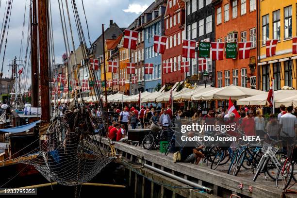 Copenhagen historic harbor and restaurant mile, Nyhavn , is all dressed up to welcome the Euro 2020 football fans on July 03, 2021 in Copenhagen,...