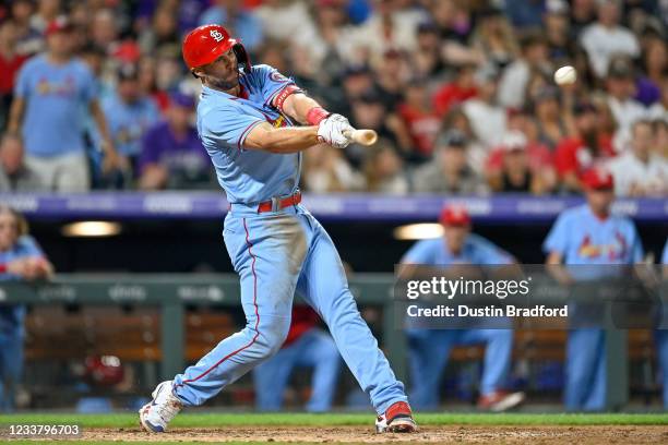 Paul Goldschmidt of the St. Louis Cardinals hits an eighth inning RBI single against the Colorado Rockies at Coors Field on July 3, 2021 in Denver,...