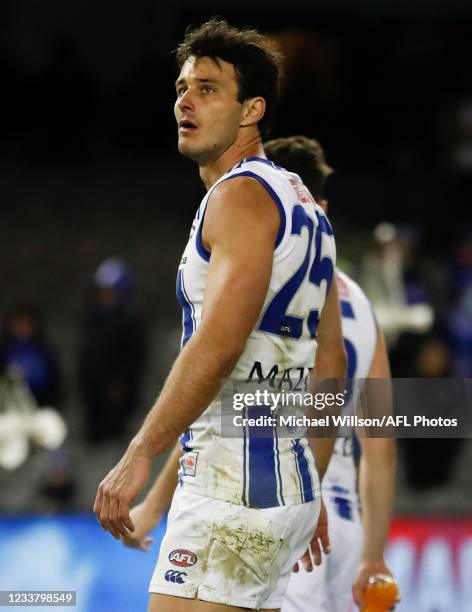 Robbie Tarrant of the Kangaroos looks dejected after a loss during the 2021 AFL Round 16 match between the Western Bulldogs and the North Melbourne...