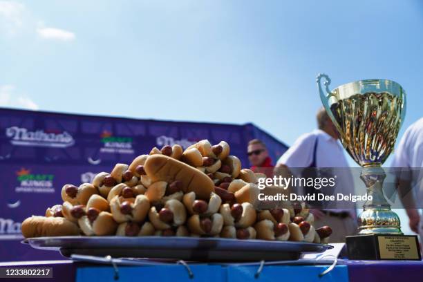 Hot dogs are prepared for the 2021 Nathan's Famous 4th Of July International Hot Dog Eating Contest on July 4, 2021 in New York City. The first...