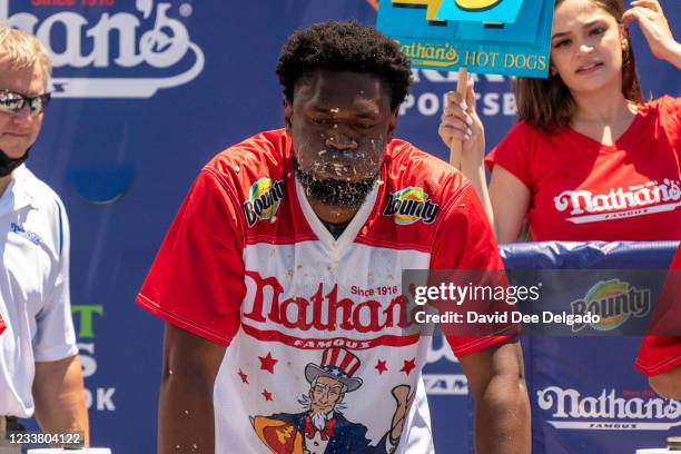 Competitive eater Gideon Oji participates in the 2021 Nathan's Famous 4th Of July International Hot Dog Eating Contest on July 4, 2021 in New York...