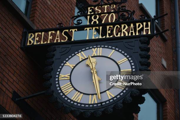 Street clock with a logo of The Belfast Telegraph, a daily newspaper published in Belfast, Northern Ireland. On Saturday, 03 July 2021, in Belfast,...