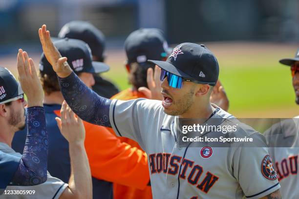 Houston Astros shortstop Carlos Correa celebrates following the Major League Baseball game between the Houston Astros and Cleveland Indians on July 4...
