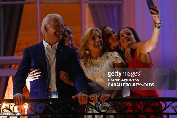 President Joe Biden , First Lady Jill Biden , daughter Ashley Biden and granddaughters Finnegan Biden and Naomi Biden pose for a selfie during...