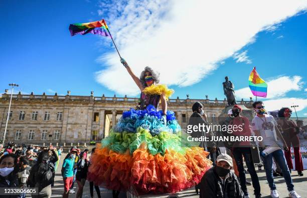 Member's of the LGBTIQ community take part in the Pride Parade at Bolivar square in Bogota, on July 4, 2021.