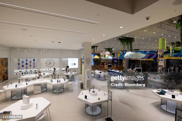 Customers look at Samsung Electronics Co. Products at the company's Digital Plaza store in Seoul, South Korea, on Saturday, July 3, 2021. Samsung...