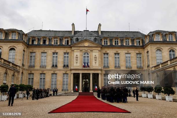 The red carpet is rolled out ready for the arrival of the Italian President at the Elysee Palace in Paris on July 5, 2021.