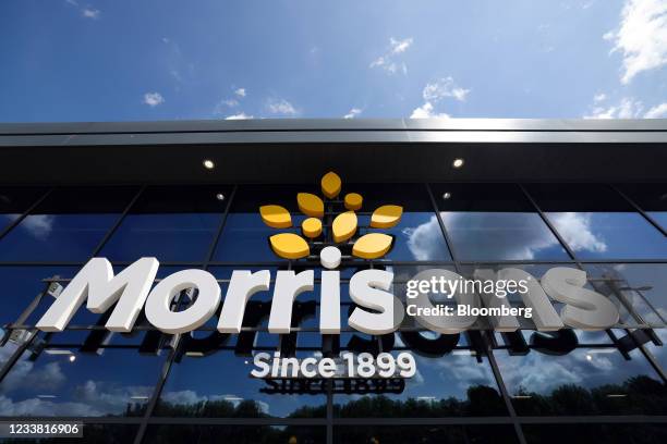 Sign outside a Morrisons supermarket, operated by Wm Morrison Supermarkets Plc, in Saint Ives, U.K., on Monday, July 5, 2021. Apollo Global...