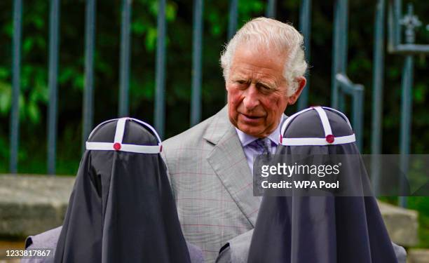 Prince Charles, Prince of Wales meets with members of the Bridgettines, an order of sisters, during a visit to St Winefride's Guest House as part of...