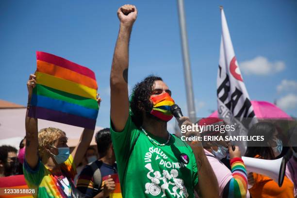 Member of the LGBTI community speaks during a protest against the approval in the Chamber of Deputies of a new criminal code, outside the National...