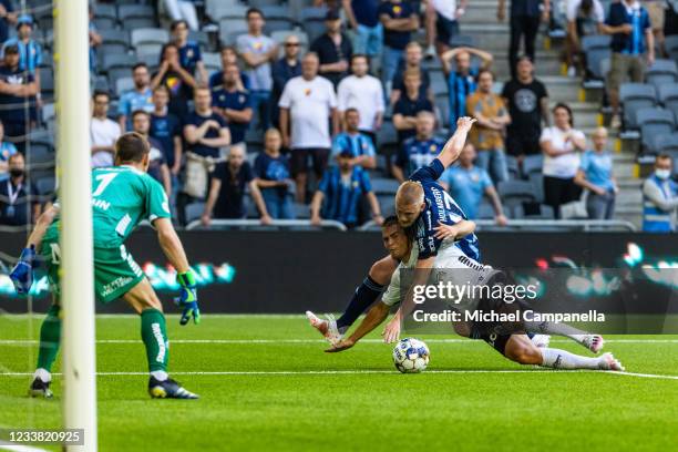 Kalle Holmberg of Djurgardens IF in a duel with Orebros Benjamin Hjertstrand during the Allsvenskan match between Djurgardens IF and Orebro SK at...