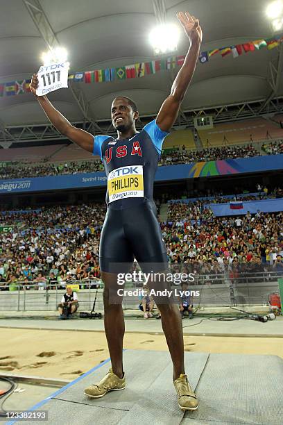 Dwight Phillips of the USA celebrates his victory in the men's long jump final during day seven of 13th IAAF World Athletics Championships at Daegu...